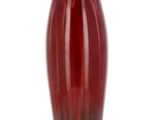 a red vase that is sitting on a table