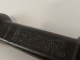 a close up of a wrenet on a white surface