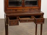 an old wooden desk with two drawers and a drawer underneath it