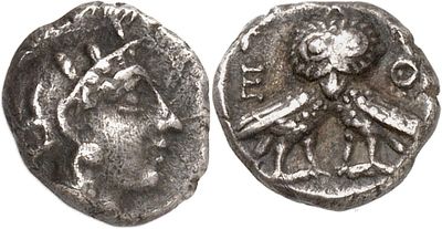 a close up of a silver coin with a man on it