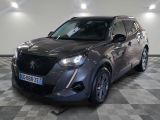 the grey suv is parked in the garage on a checkered floor