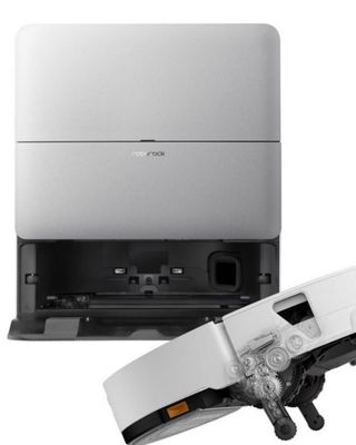 a close up of a laptop and a printer on a white surface