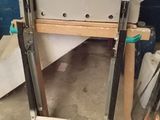 a picture of a workbench made of wood and metal