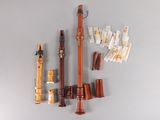 many different types of musical instruments displayed on the wall