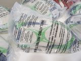 a pile of wrapped up items sitting on a table