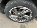 a close up of a tire on a car ' s rim