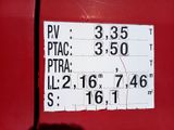 a sign on the side of a red truck that says dv, ptac, ptac, ptra