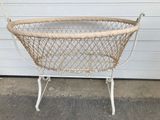 a wicker basket that is sitting on a stand