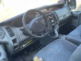 a car that has a steering wheel and a seat in it
