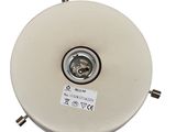 an overhead view of a white circular object with a button on it