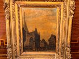 an old picture of a picture of a city with a church in the background