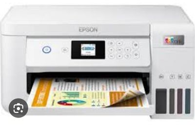 the printer is sitting on top of the paper in front of the printer