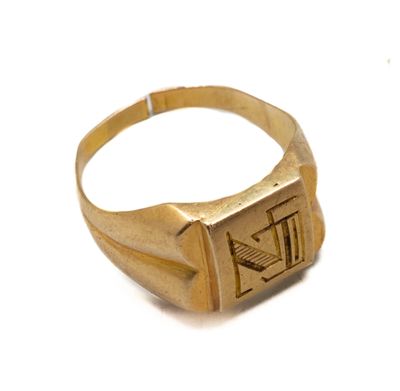 an image of a gold signet ring with the letter n on it
