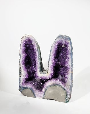 an image of a piece of amethorate on a white surface