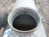 a metal pipe with a hole in the middle of it