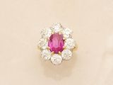 a ruby and diamond cluster ring