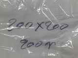 a plastic bag with writing on it sitting on a table