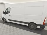 a picture of a white van parked in a garage