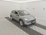the silver suv is parked in the garage on the checkered floor