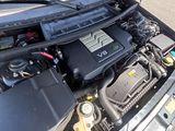 the engine of a car with its hood open and the hood open