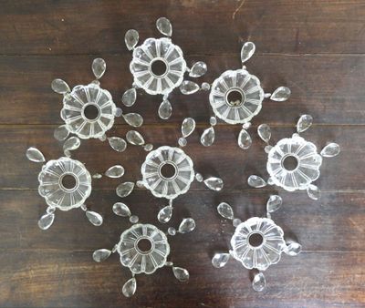 many pieces of glass on a wooden table
