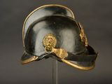 a helmet with a lion on it on a stand