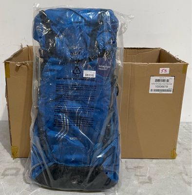 a bag of luggage sitting next to a box of luggage
