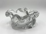 an image of a clear glass bowl with a bird on it