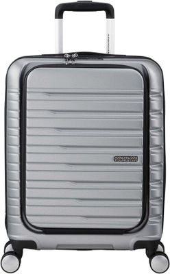 silver suitcase with black handle and wheels on a white background