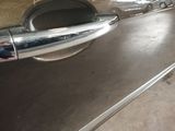 a close up of a door handle on a car