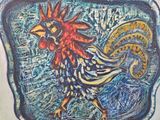 a painting of a rooster that is on the wall