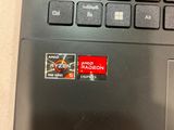 a close up of a laptop with a sticker on it