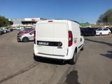 a white van that is parked in a parking lot