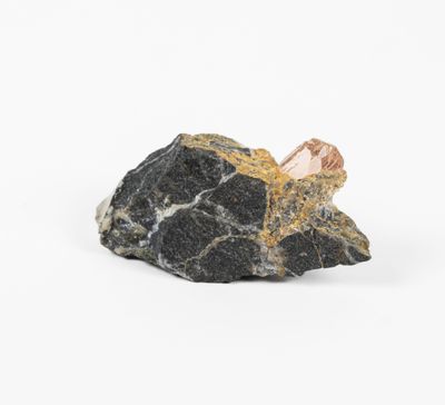 a rock with a small piece of rock on top of it