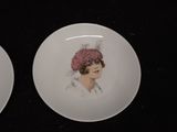 two plates with a picture of a woman on them