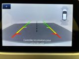 an image of a car ' s rear view mirror showing the location of the vehicle