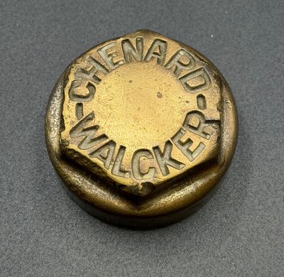an old brass button with the words ' the war is over ' written on it