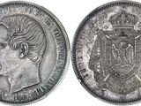 a close up of a coin with a woman ' s face on it