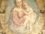 une image d'un tableau représentant une femme tenant un enfant dans ses bras