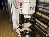une image d'une machine qui se trouve dans une cuisine