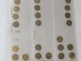 a lot of coins in a plastic bag on a table