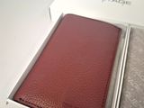 a box with a wallet inside of it on a table