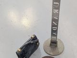 a gun, a hat, and a hat stand on the floor
