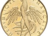 une image montrant un gros plan d'une pièce de monnaie sur laquelle figure un oiseau