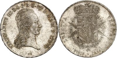 a silver coin with a crown on the front and a crown on the back