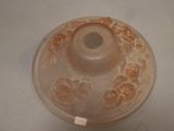 a white bowl with a lid that has flowers on it