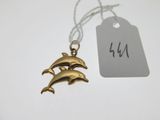 two dolphins on a string with a price tag attached to it