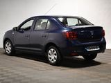 a picture of a small blue car parked in a garage