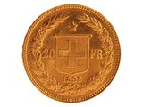 l'image d'une pièce d'or sur laquelle figurent des armoiries