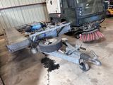 an image of a truck being worked on in a garage